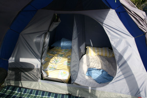 Cypress Lodge - €20 per person per night2-4 person tent with single sleeping area that can be divided into two compartments. Head height entrance lobby, side entrance and canopy porch opening. Curtained windows, storage pockets. Foam mattresses and bedding included.